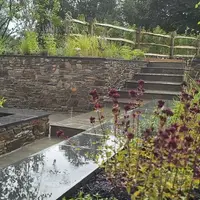 Our Brazilian Slate used for flower bed borders
